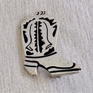 Vintage sterling silver cowboy boot pin.  Signed.